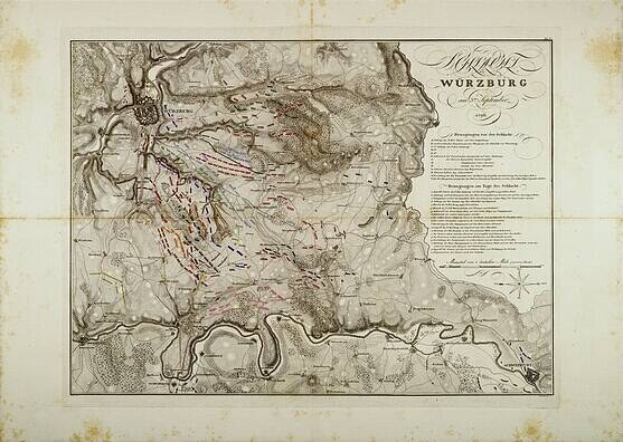 Detailierte alte Karte von Würzburg, Deutschland, zeigt Straßen, Gebäude und Sehenswürdigkeiten mit begleitendem Text über Bevölkerung, Straßen und bemerkenswerte Merkmale.