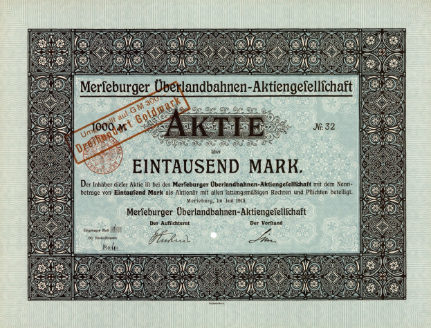 Alter deutscher Aktienchein mit schwarzem Rand, rotem Stempel und gedrucktem Text.