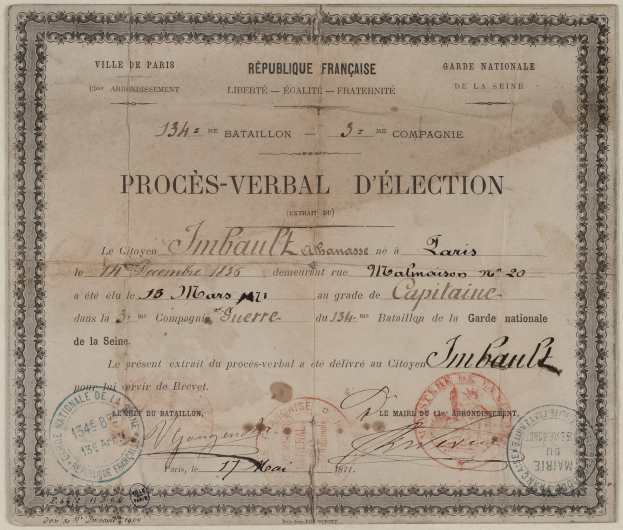 Wahlpapier mit zwei Stempeln und handgeschriebenem Text.