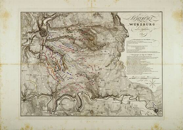 Ein detaillierter alter Stadtplan von Wurzburg, Deutschland, der Straßen, Gebäude und Sehenswürdigkeiten zeigt, mit begleitendem Text, der Informationen über die Bevölkerung, Straßen und bekannte Orte liefert.
