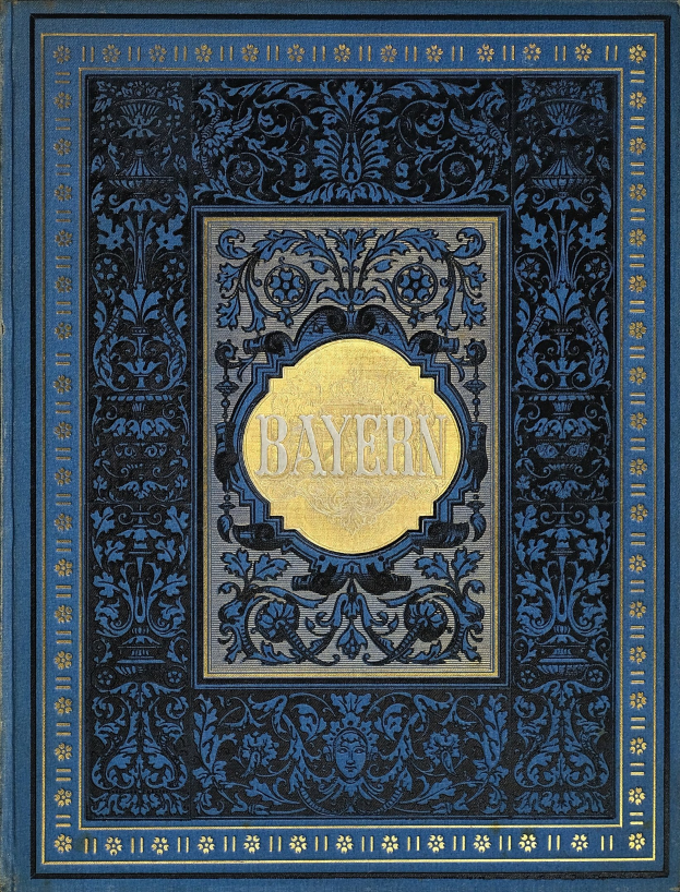 Ein blau-goldenes Buch mit dem Wort "Bayern" darauf, das mit detaillierten Dekorationen verziert ist.
